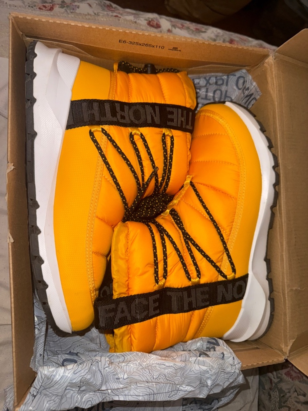 The North Face Women’s Yellow Puffer Winter Boots with Black Accents